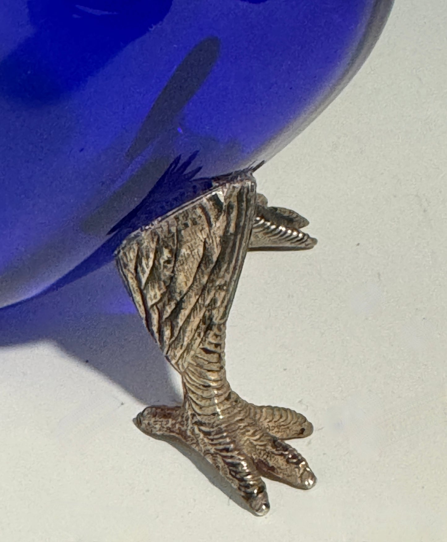 A Bristol Blue Glass and Hallmarked Silver Cockatoo Parrot Claret Jug