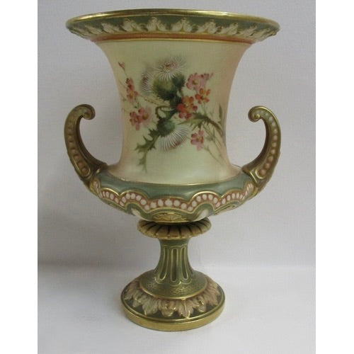 A Royal Worcester blush ivory campana shaped vase, decorated with thistles and flowers c1900
