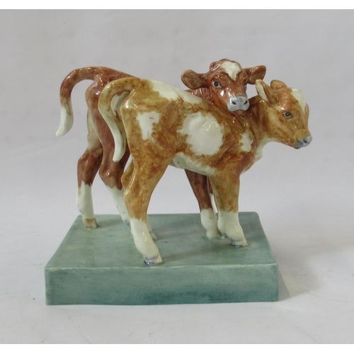 A Royal Worcester figurine of Calves 3146 modelled by Doris Lindner from the zoo babies series