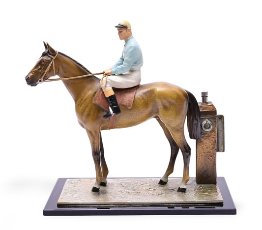 An Art Deco Austrian Cold Painted Spelter Table Lighter in the form of a Racehorse