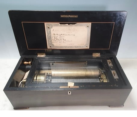 A 19th Century Swiss Musical Box playing six airs by Nicole Freres
