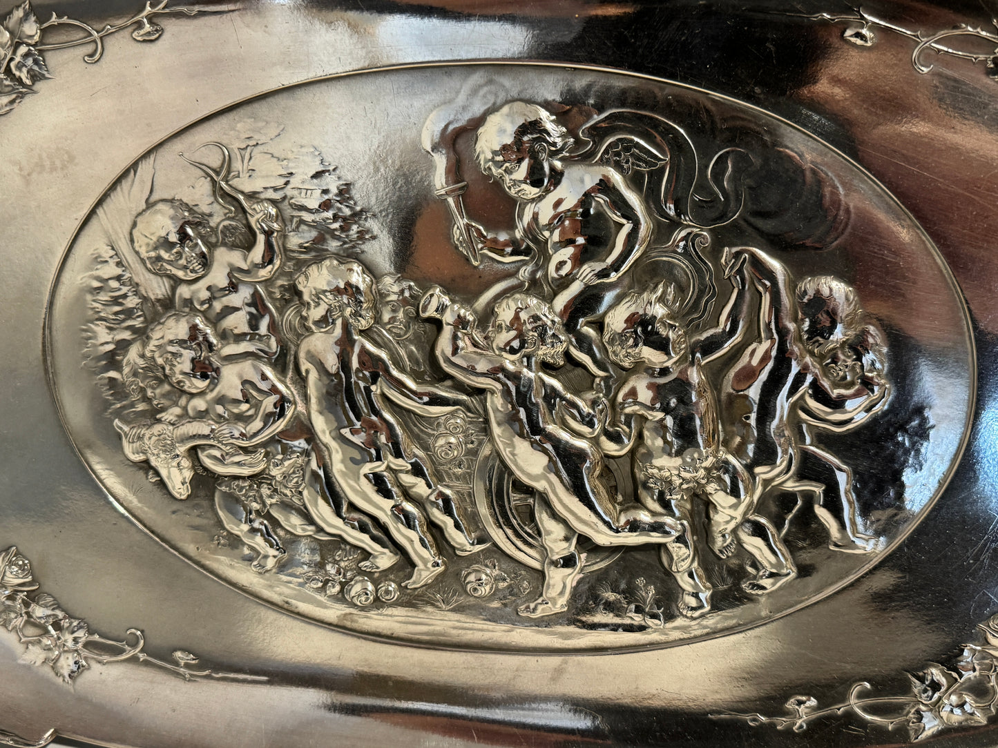 A Large Antique Silver Plated WMF Tray with Embossed Cherubs signed c1910