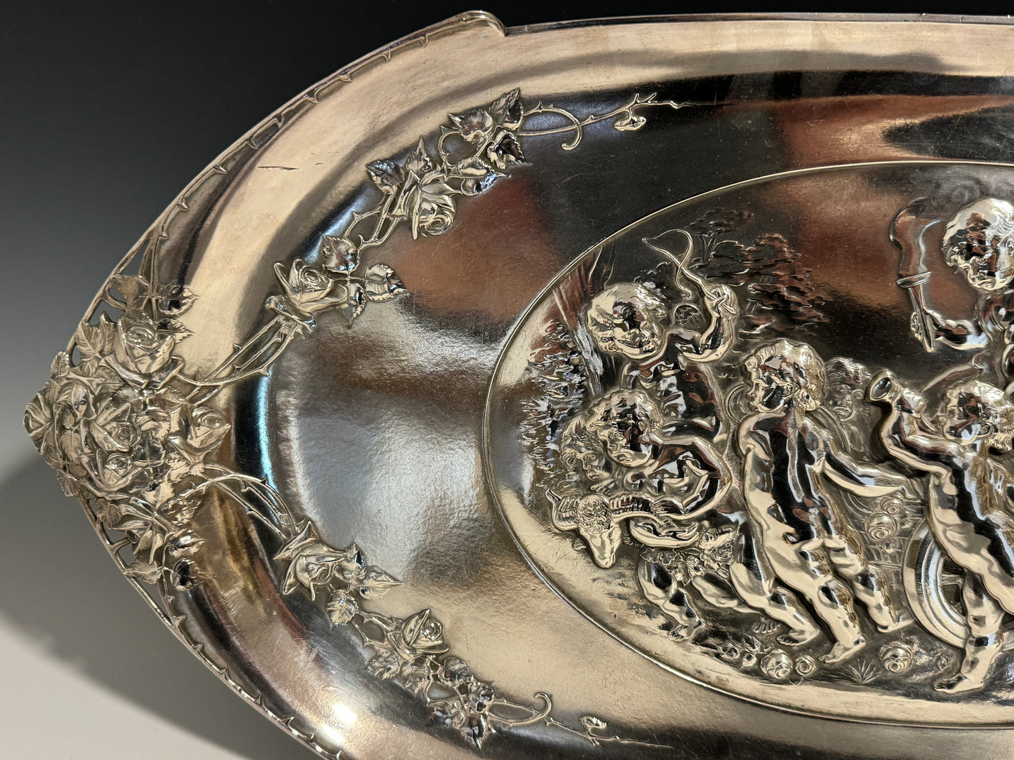 A Large Antique Silver Plated WMF Tray with Embossed Cherubs signed c1910